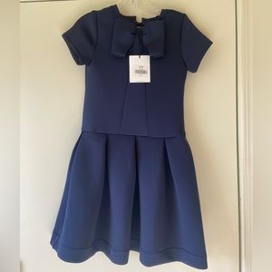 brand new with tag  girls dress in navy blue  blue size 12!
